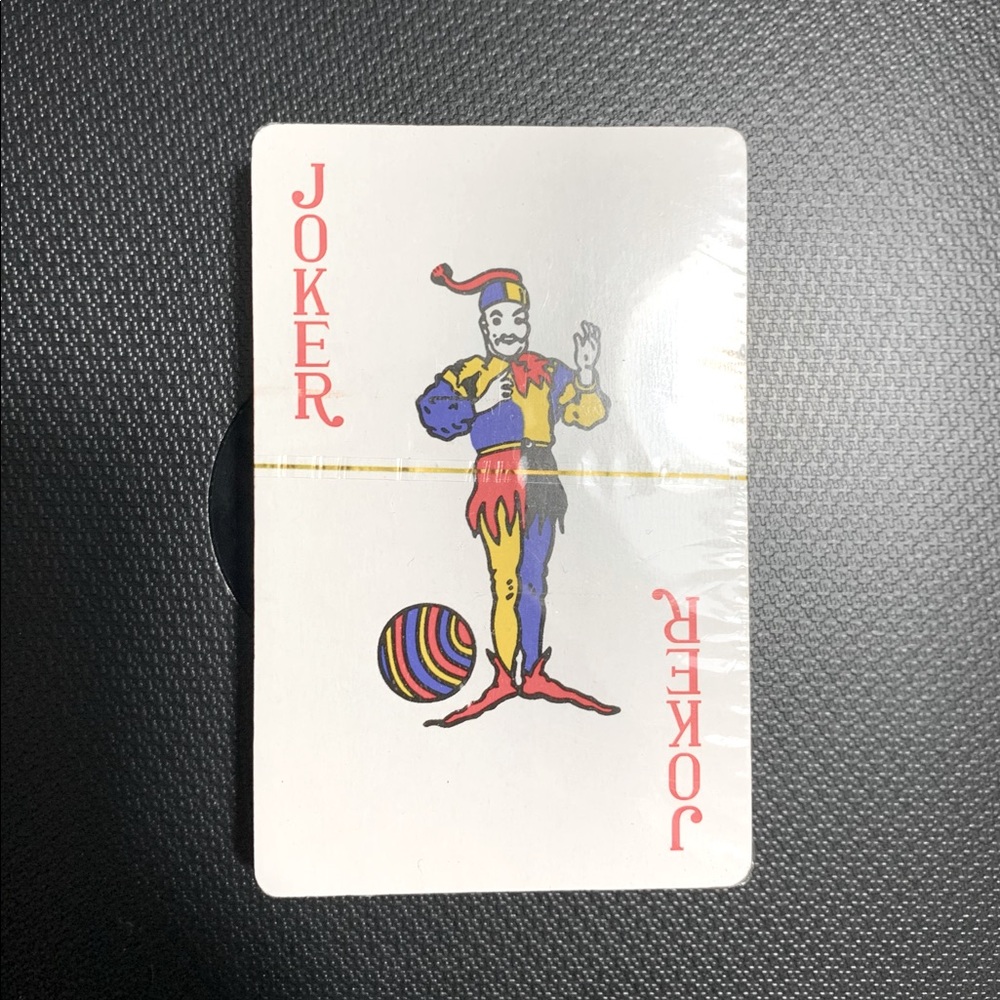Brand new unopened rainbow playing cards.